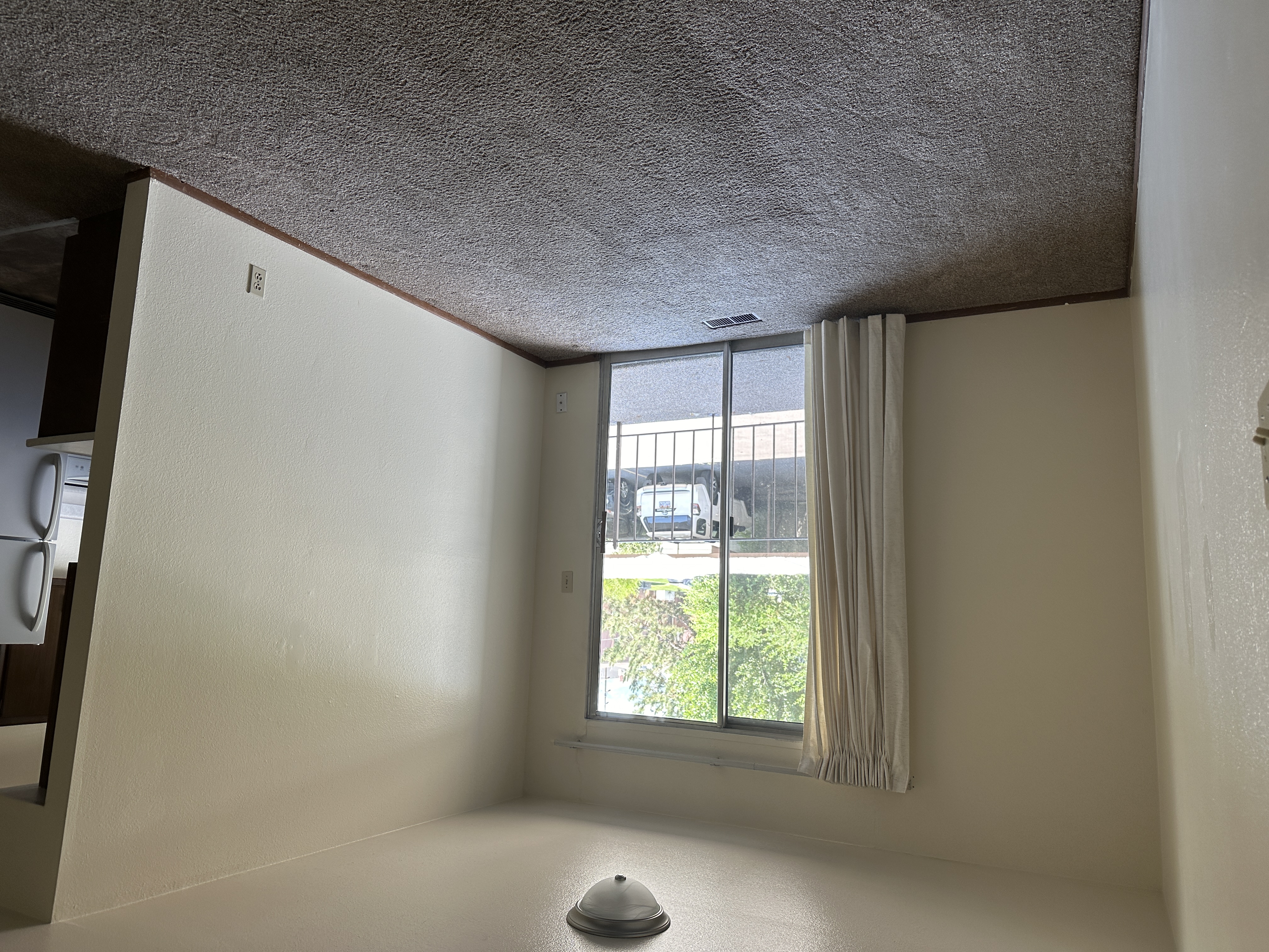 Spacious living room with balcony access